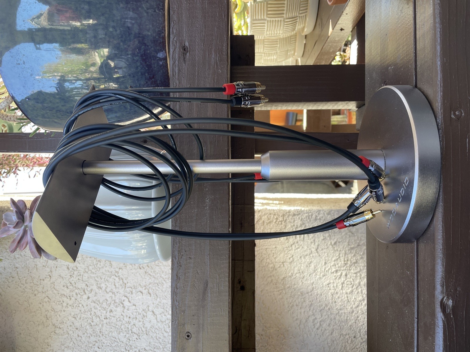 Mogami Amphenol Cables hanging from Woo Audio headstand on a plant table